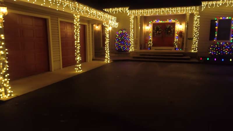 Clip the plastic clip to gutters, eaves, siding, or railing to hang light strands.