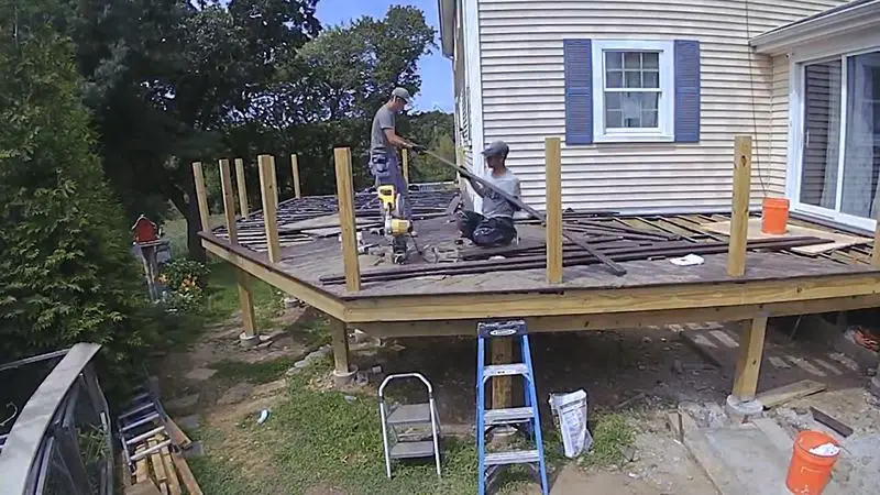 Man Building L Shape Deck