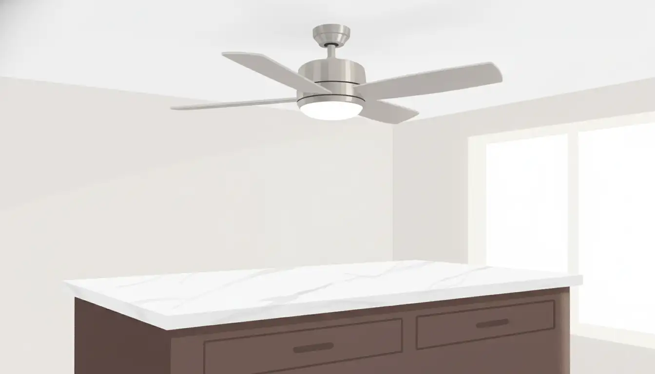 A modern brushed nickel ceiling fan with integrated LED light mounted on a white ceiling above a dark wood kitchen island with a marble countertop.