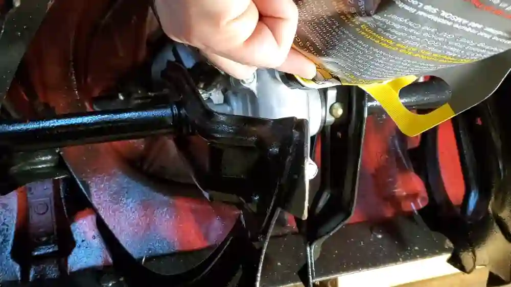 Filling the snowblower auger gearbox with oil