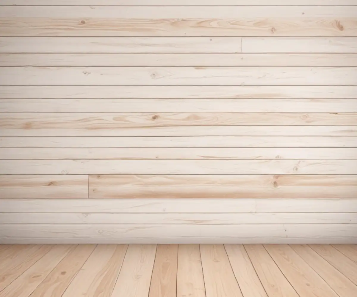 A rustic and bright interior wall featuring horizontally laid cedar planks with a whitewash finish that subtly reveals the natural wood grain.